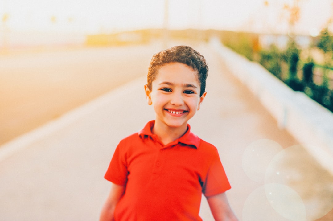 smiling-boy-wearing-red-polo-shirt-hawds8eccbc